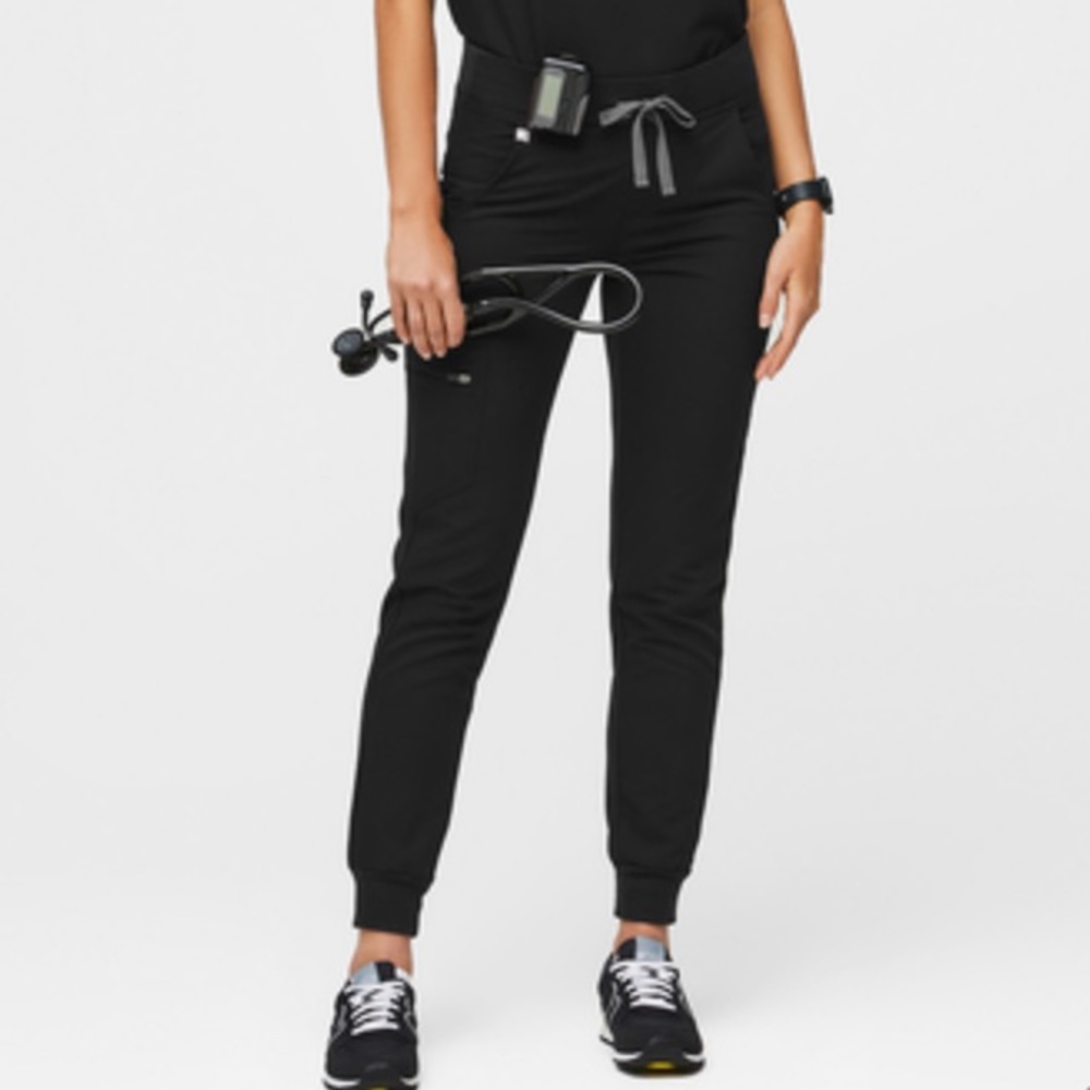 Small FIGS jogger scrub pants in black.